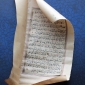 Старинный иранский амулет с рукописным текстом Корана и подвесками с изображение