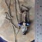 Кулон на цепочке, сделанный из детали старого накосного украшения афганских кирг