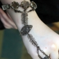 Браслет с кольцом со вставками со змеиной кожей - авторское украшение. Автор - Щ