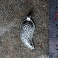 Подвеска - деталь украшения. Афганистан, 20 в. Выполнена в форме орнамента "Бада