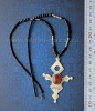 Колье с подвеской в виде туарегского амулета с сердоликовой вставкой